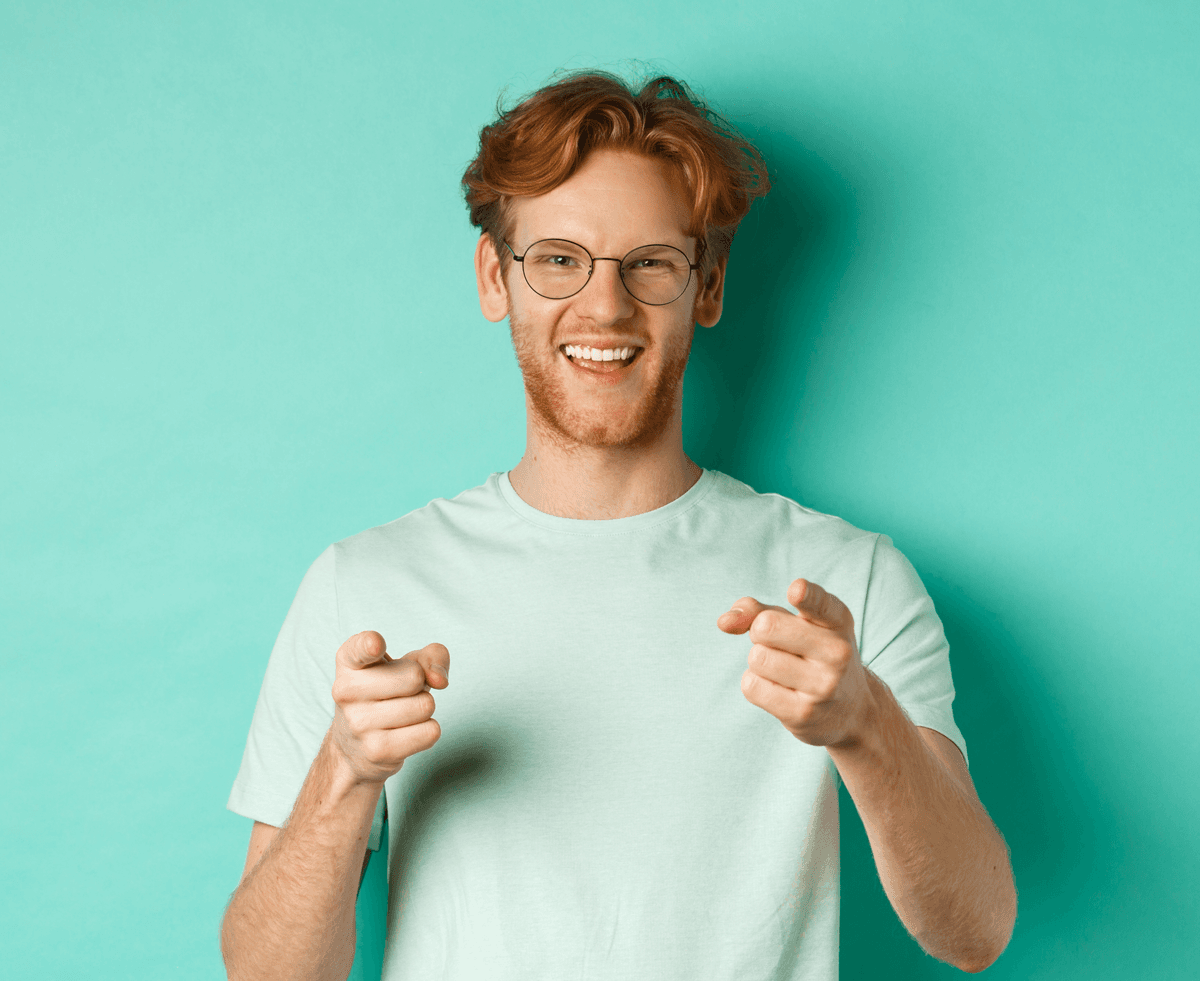 Hero image showing a man on a teal background happy about his prediction.